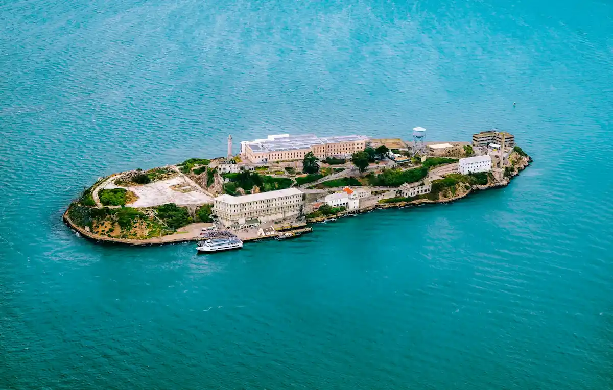 Alcatraz Island with ferry approaching across the San Francisco Bay.